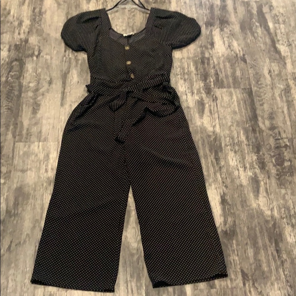 Black and white polka dot jump suit